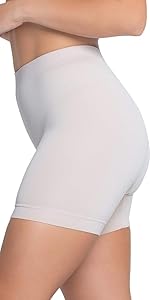 Woman wearing light colored slip shorts